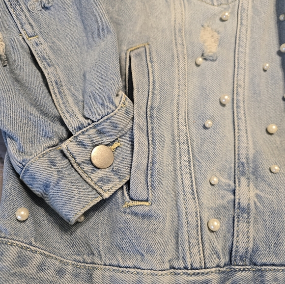Free People classic cut denim jacket adorned with pearl accents. - Picture 2 of 9